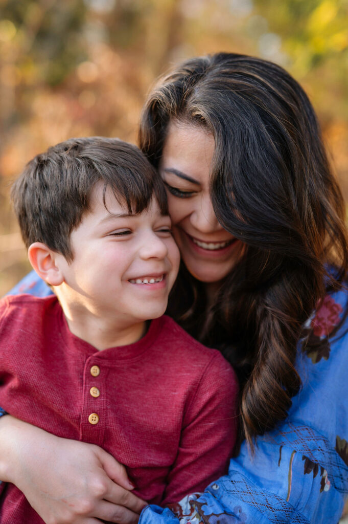 Virginia wedding photographer and single mom Victoria V hugging her son