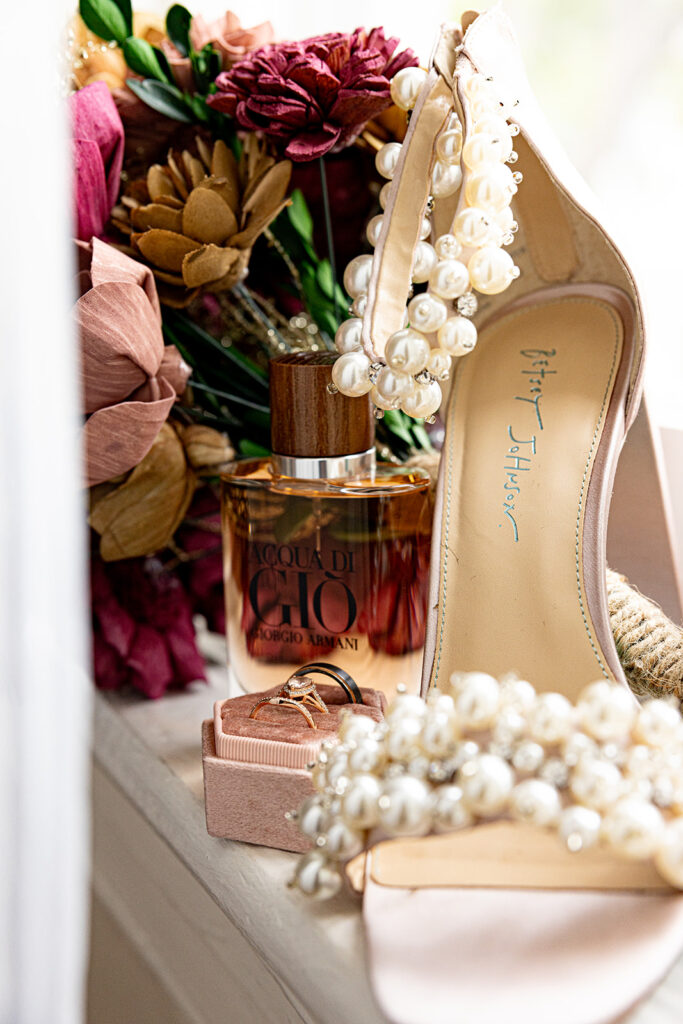 Flat lay of bridal details photographed during full wedding photography hours