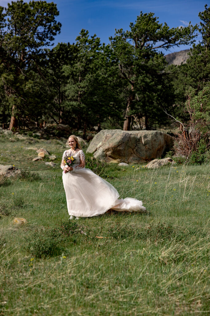 Bride and Groom at Moraine Park, Rocky Mountain National Park, for an Colorado elopement with professional photos by a Colorado elopement photographer