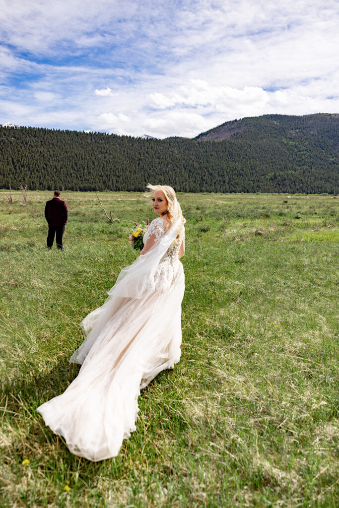 Bride and Groom at Moraine Park, Rocky Mountain National Park, for an Colorado elopement with professional photos by a Colorado elopement photographer