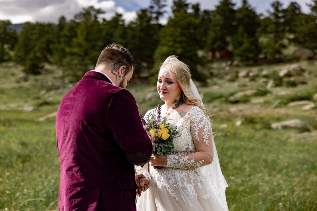 Bride and Groom at Moraine Park, Rocky Mountain National Park, for an Colorado elopement with professional photos by a Colorado elopement photographer