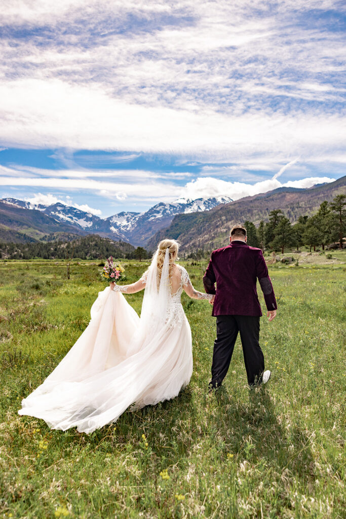 Bride and Groom at Moraine Park, Rocky Mountain National Park, for an Colorado elopement with professional photos by a Colorado elopement photographer