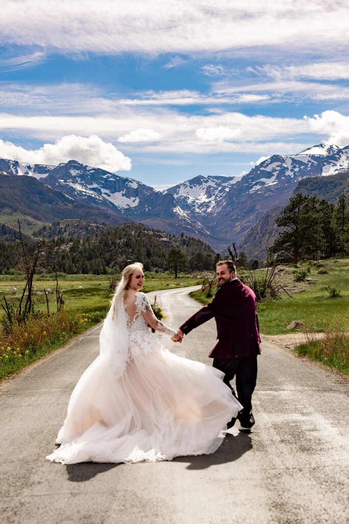 Bride and Groom kissing at Moraine Park, Rocky Mountain National Park, for an Colorado elopement with professional photos by a Colorado elopement photographer