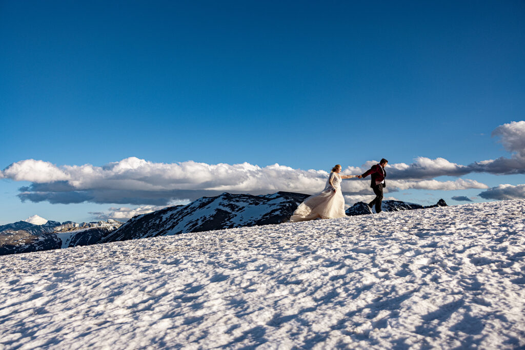 Professional photos by a Colorado elopement photographer of a Bride and groom during a Colorado elopement at Rocky Mountain National Park