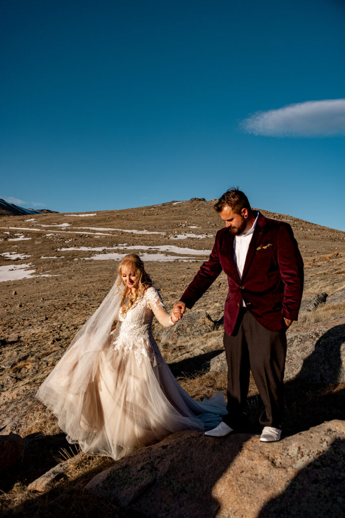 Professional photos by a Colorado elopement photographer of a Bride and groom during a Colorado elopement at Rocky Mountain National Park