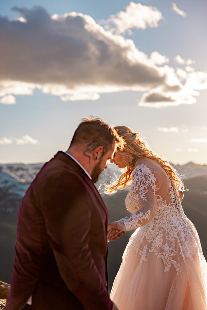 Professional photos by a Colorado elopement photographer of a Bride and groom during a Colorado elopement at Rocky Mountain National Park