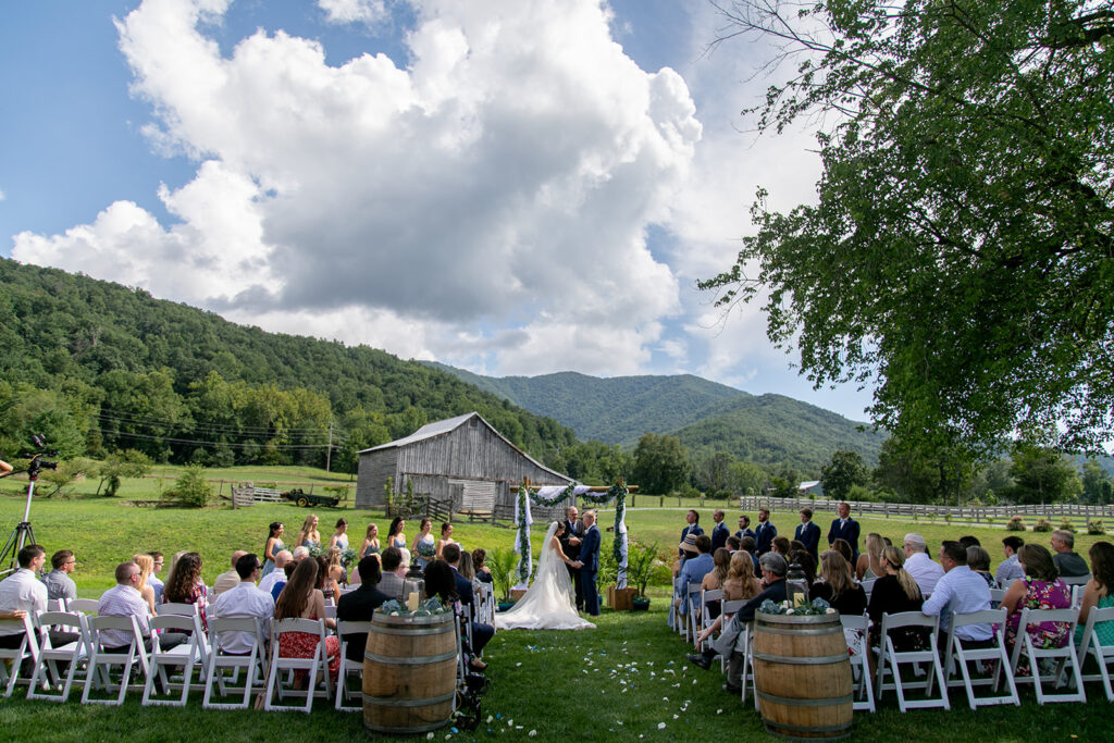 Bride and groom during their wedding ceremony at a shenandoah wedding venue on their wedding day