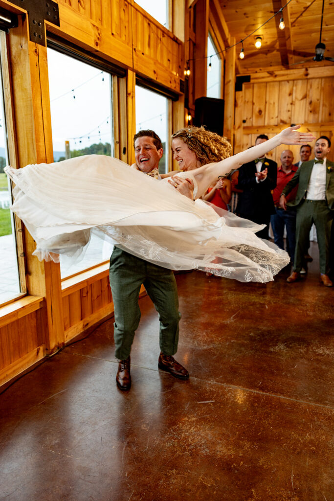 Bride and groom doing their first dance and enjoying their reception on their wedding day at a Shenandoah wedding venue Faithbrooke Farm and Vineyards