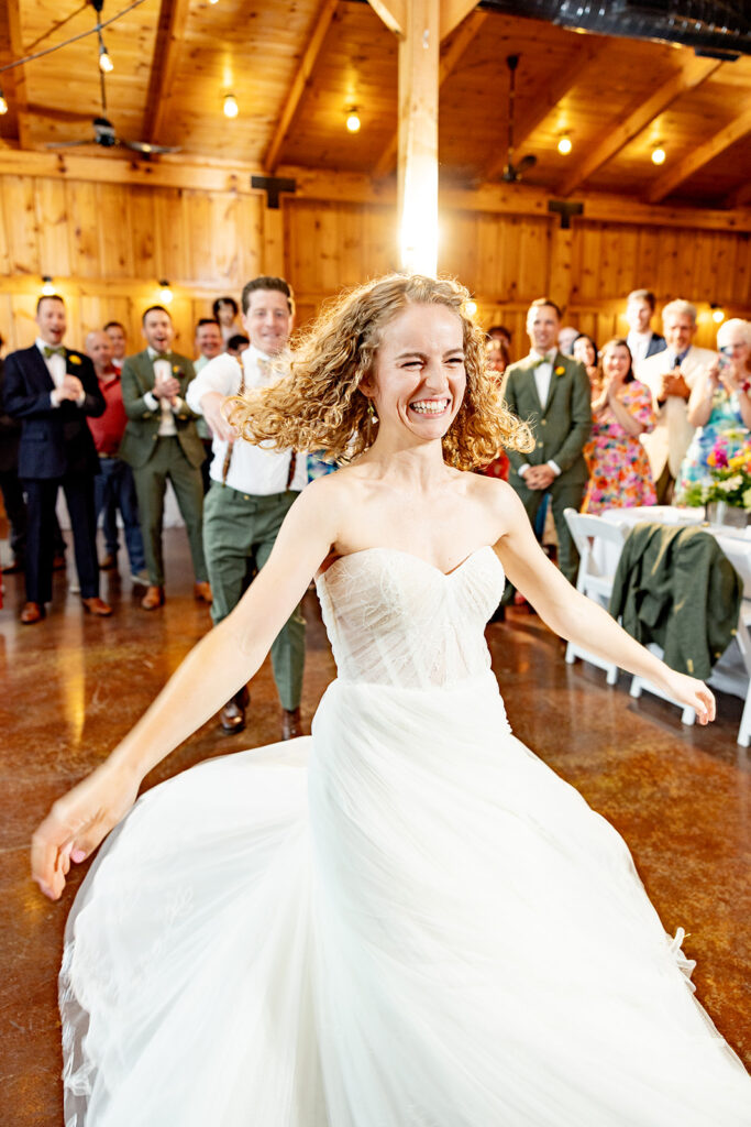 Bride and groom doing their first dance and enjoying their reception on their wedding day at a Shenandoah wedding venue Faithbrooke Farm and Vineyards