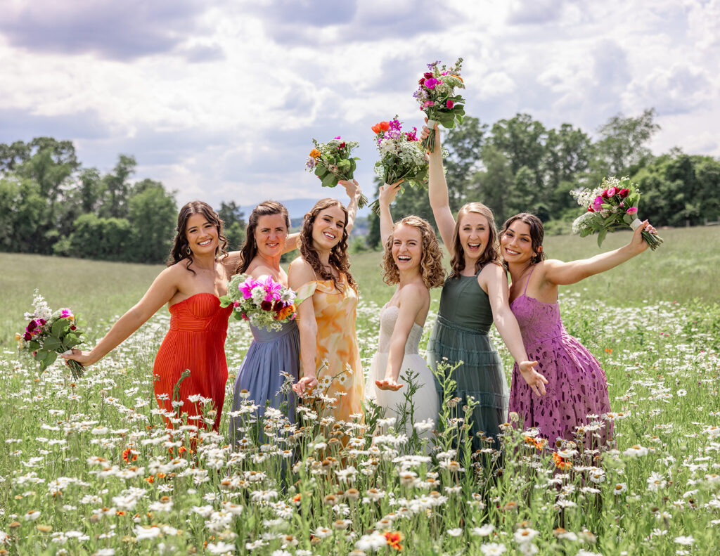 Bridal party during a spring wedding at a shenandoah wedding venue on their wedding day