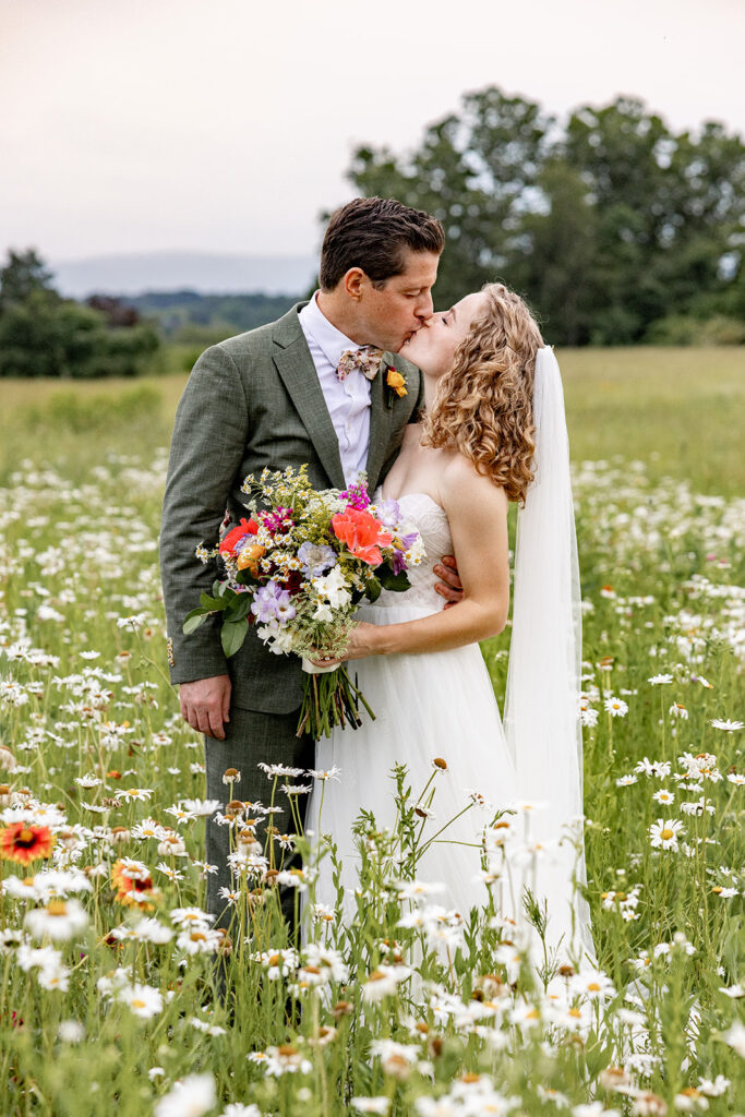 Bride and groom sunset portraits sunset photos on their wedding day at a Shenandoah wedding venue, faithbrooke farm and vineyards for a spring wedding in Shenandoah