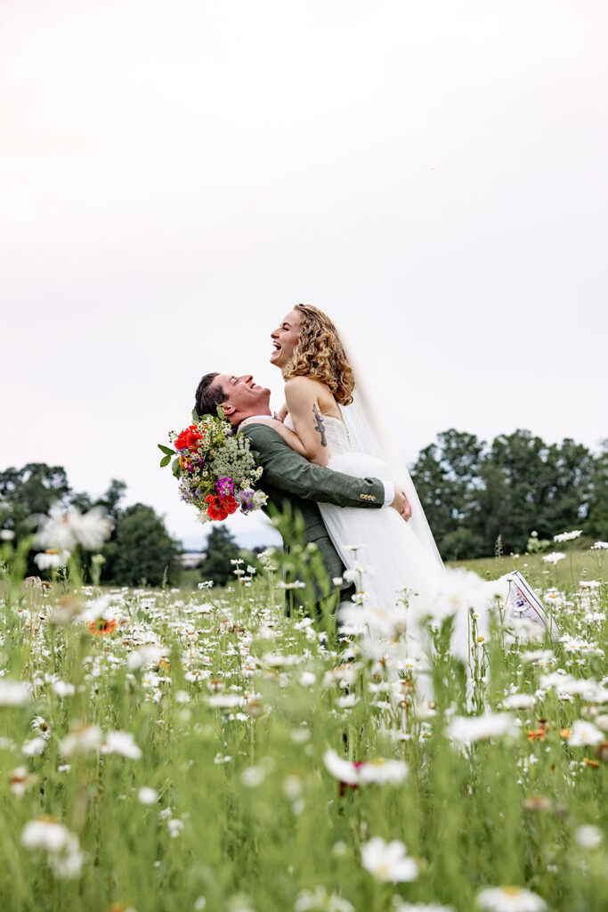 Bride and groom sunset portraits sunset photos on their wedding day at a Shenandoah wedding venue, faithbrooke farm and vineyards