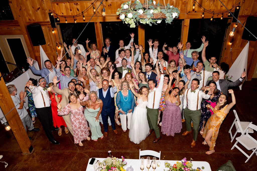 Bride and groom partying and enjoying their reception on their wedding day at a Shenandoah wedding venue Faithbrooke Farm and Vineyards