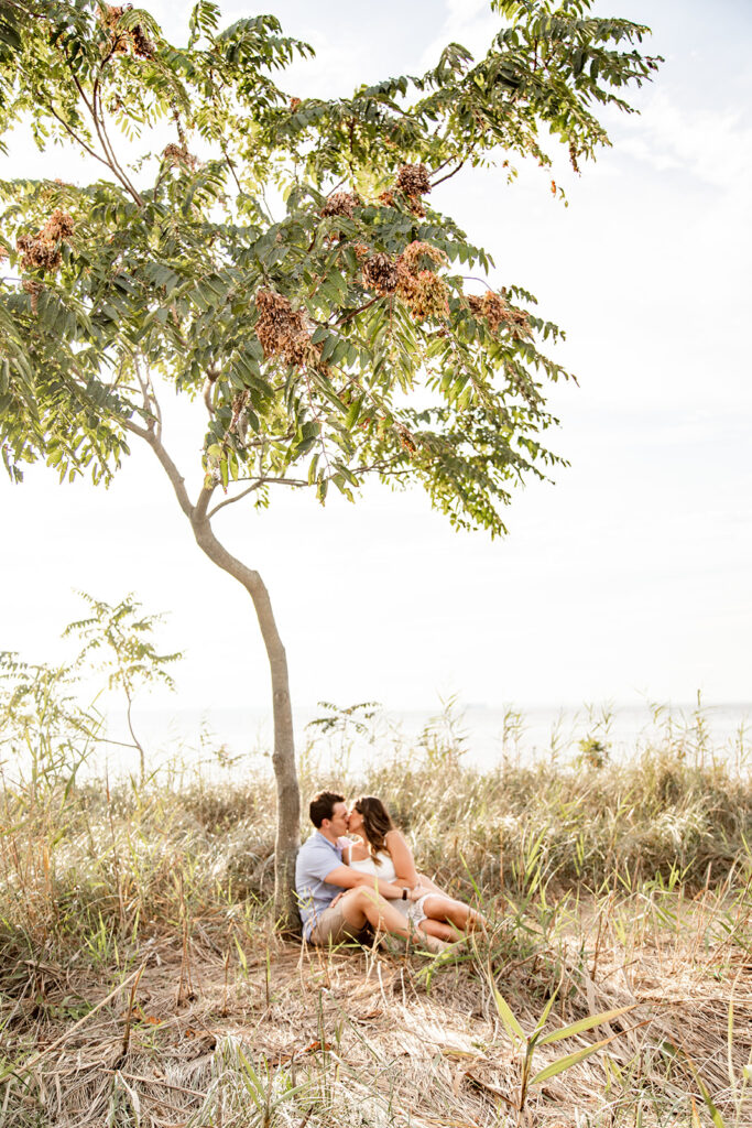 Bride and Groom pose for their Annapolis, md engagement session with Victoria V Photography the best wedding photographer in Annapolis. Annapolis engagement session. Beach engagement session. Best wedding photographer in the DMV. Destination wedding photographer. Virginia elopement photographer. Beach weddings. Beach engagements.