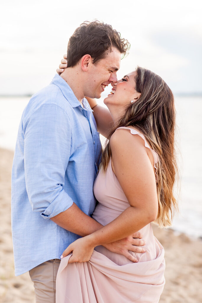 Bride and Groom pose for their Annapolis, md engagement session with Victoria V Photography the best wedding photographer in Annapolis. Annapolis engagement session. Beach engagement session. Best wedding photographer in the DMV. Destination wedding photographer. Virginia elopement photographer. Beach weddings. Beach engagements.