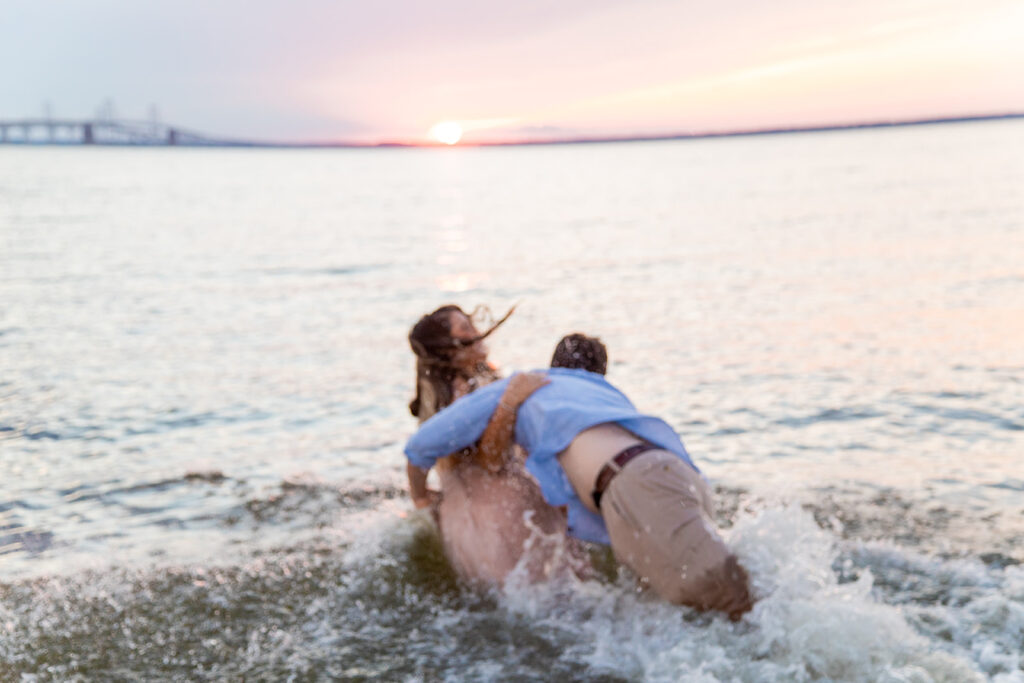 Bride and Groom pose for their Annapolis, md engagement session with Victoria V Photography the best wedding photographer in Annapolis. Annapolis engagement session. Beach engagement session. Best wedding photographer in the DMV. Destination wedding photographer. Virginia elopement photographer. Beach weddings. Beach engagements.