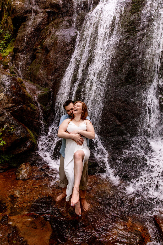 Bride and Groom for a Shenandoah engagement session at a waterfall in Shenandoah Victoria V Photography. Shenandoah waterfalls. Shenandoah sunset. Little Stony Man engagement session. Little Stony Man sunset. The best Shenandoah Wedding Photographer. The best Virginia wedding photographer. Shenandoah elopement photographer. 