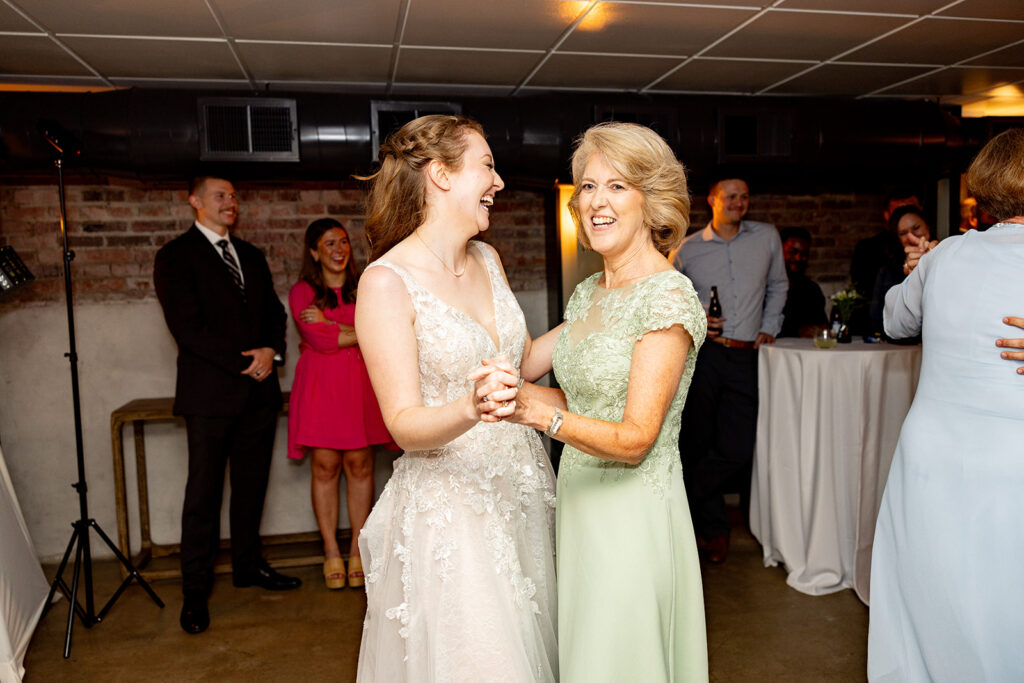 Romantic wedding portraits in downtown Fredericksburg, VA with a happy newlywed couple.