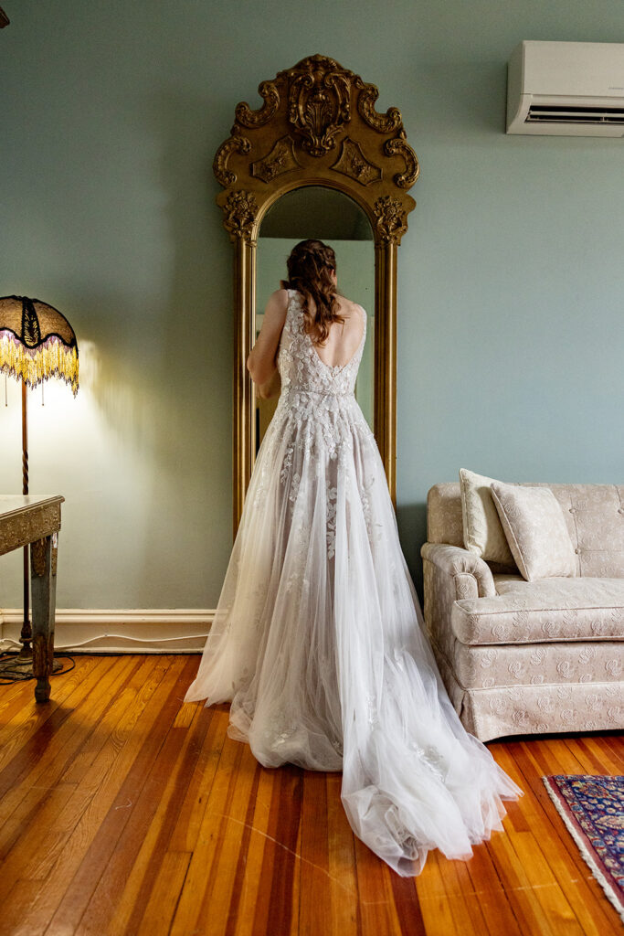 Bride getting ready for her wedding at The Ironclad Inn in downtown Fredericksburg, VA.