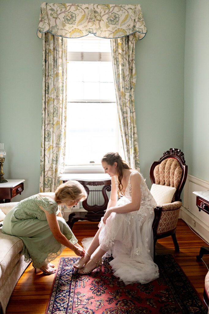 Bride getting ready for her wedding at The Ironclad Inn in downtown Fredericksburg, VA.