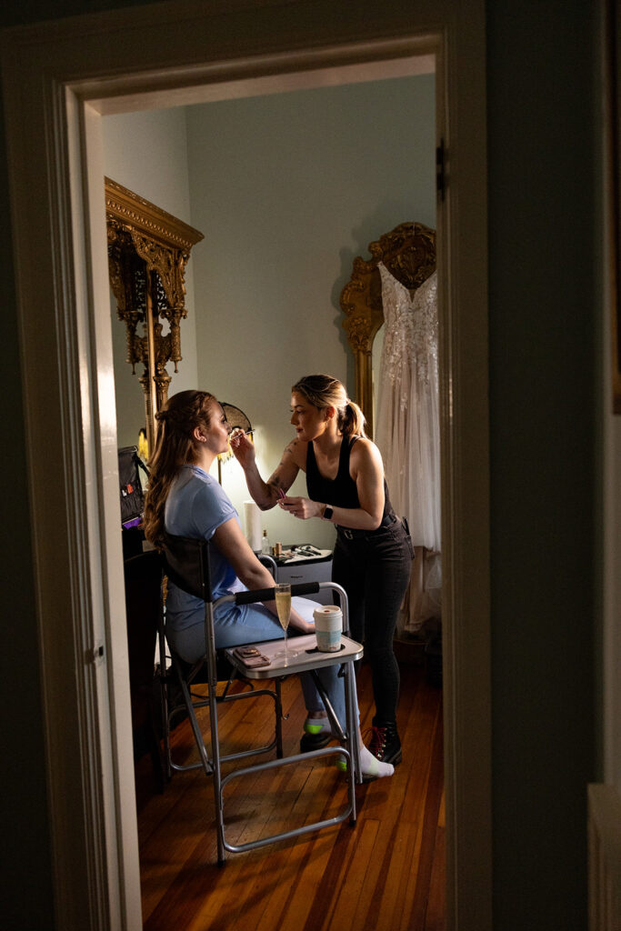 Bride getting ready for her wedding at The Ironclad Inn in downtown Fredericksburg, VA.