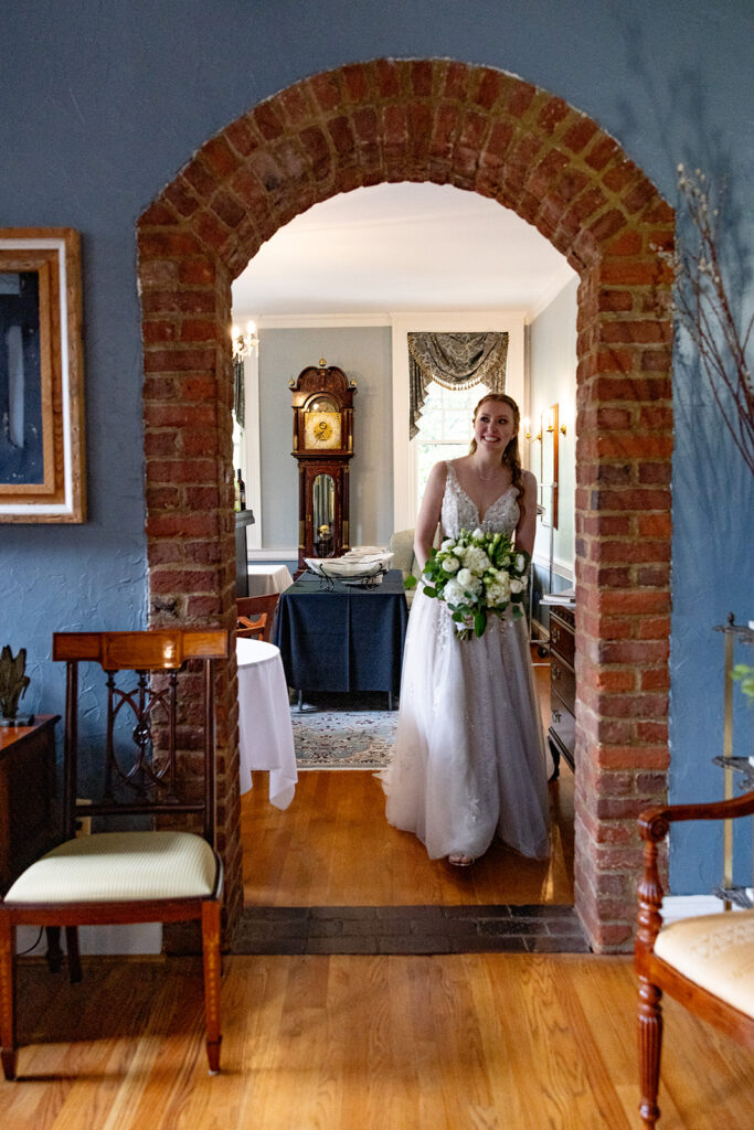 Romantic wedding portraits in downtown Fredericksburg, VA with a happy newlywed couple.