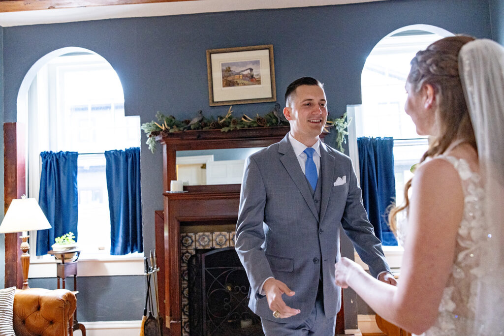 Romantic wedding portraits in downtown Fredericksburg, VA with a happy newlywed couple.