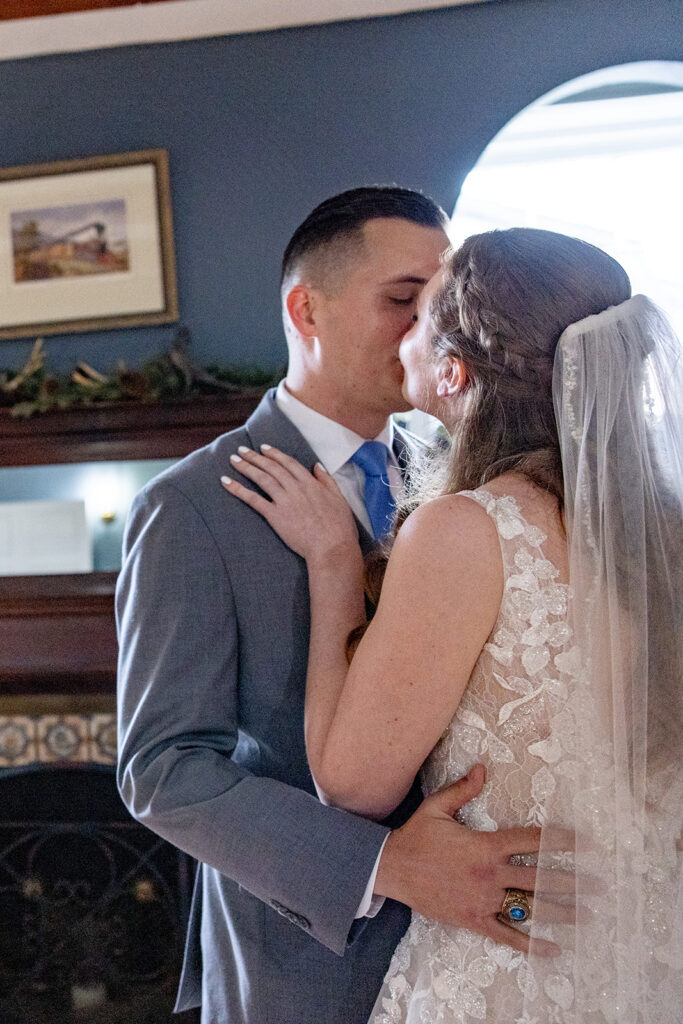 Romantic wedding portraits in downtown Fredericksburg, VA with a happy newlywed couple.