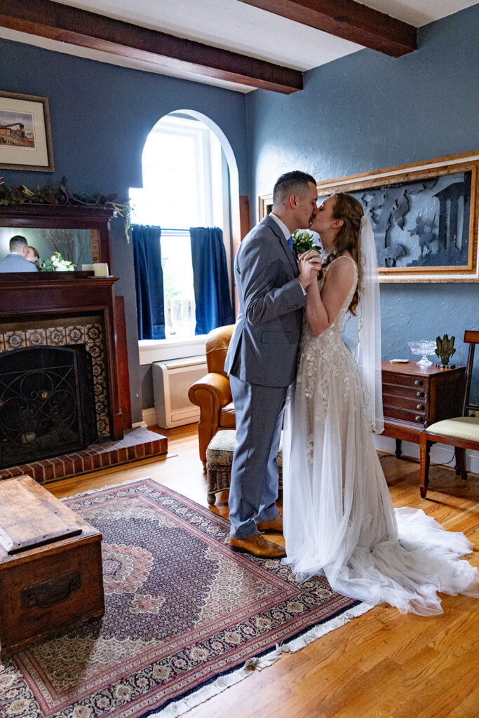 Romantic wedding portraits in downtown Fredericksburg, VA with a happy newlywed couple.