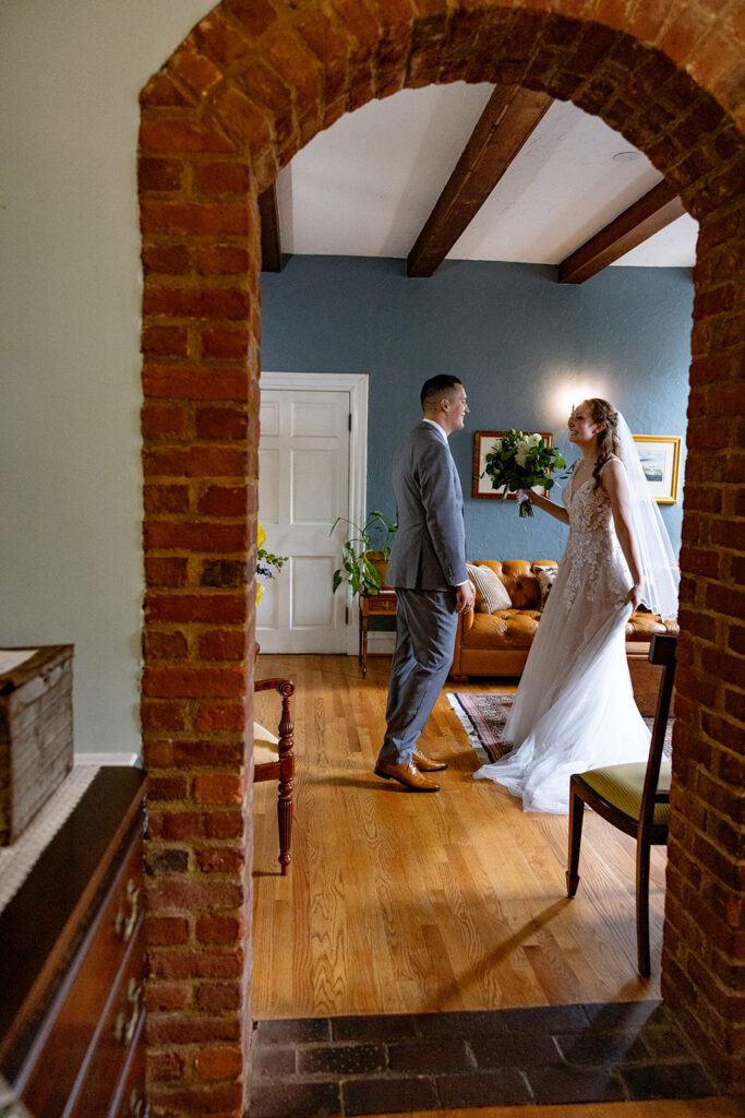 Romantic wedding portraits in downtown Fredericksburg, VA with a happy newlywed couple.