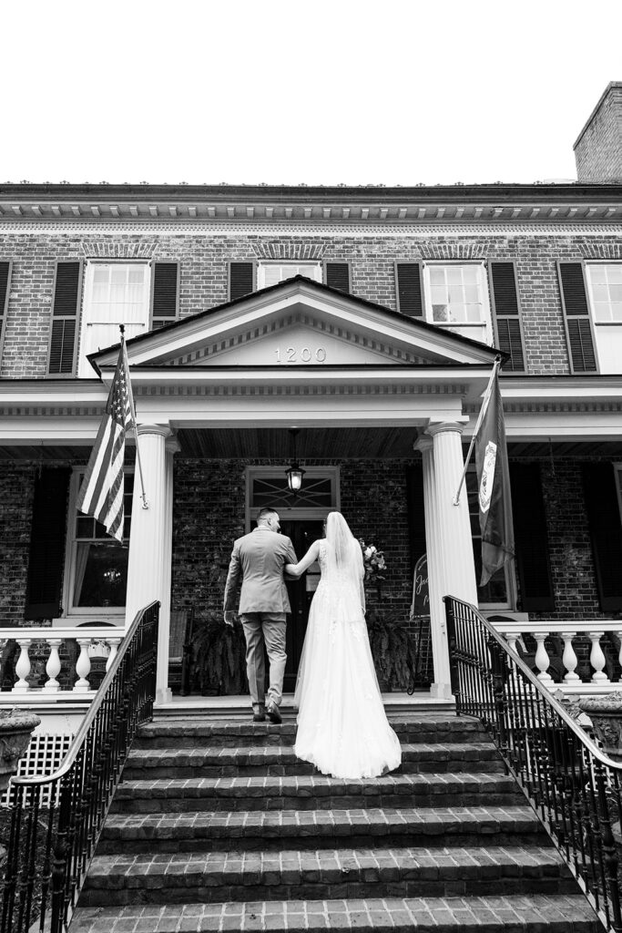 Romantic wedding portraits in downtown Fredericksburg, VA with a happy newlywed couple.