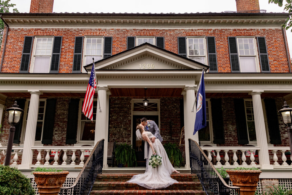 Romantic wedding portraits in downtown Fredericksburg, VA with a happy newlywed couple.