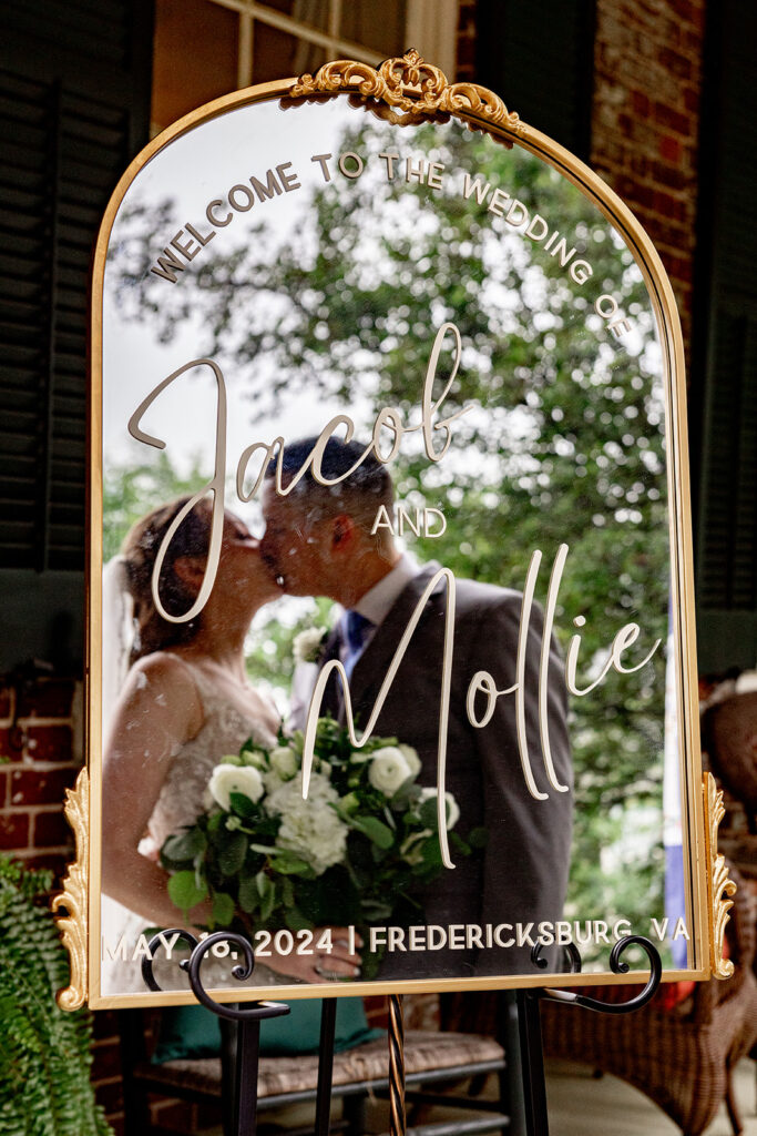 Romantic wedding portraits in downtown Fredericksburg, VA with a happy newlywed couple.