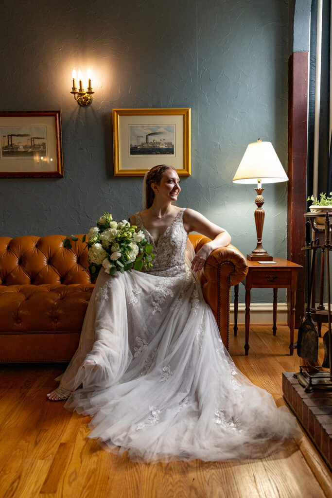 Romantic wedding portraits in downtown Fredericksburg, VA with a happy newlywed couple.