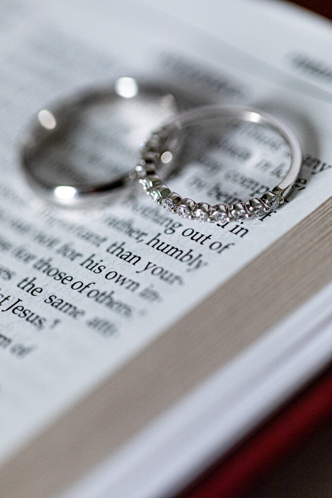 Close-up of wedding rings and bridal accessories at a Fredericksburg wedding venue.