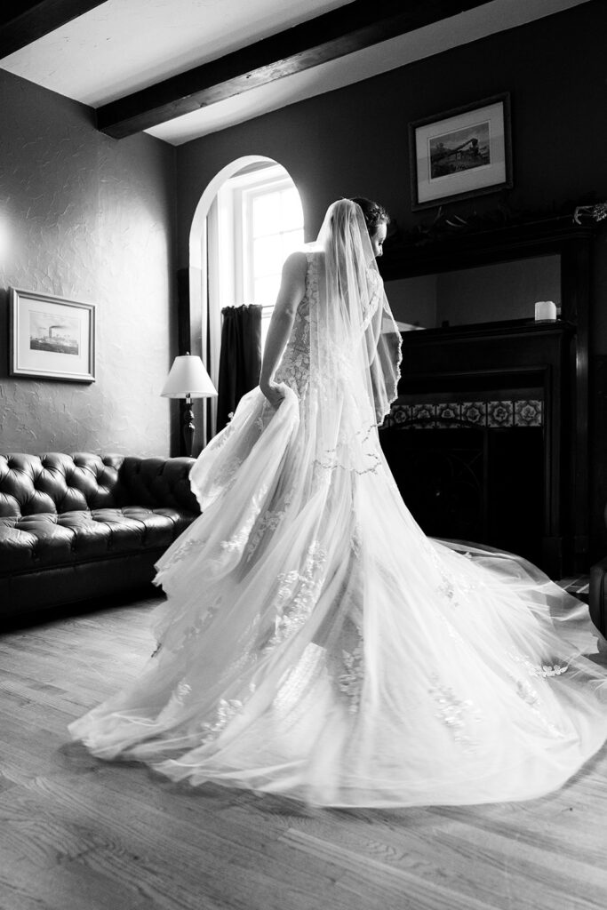 Romantic wedding portraits in downtown Fredericksburg, VA with a happy newlywed couple.