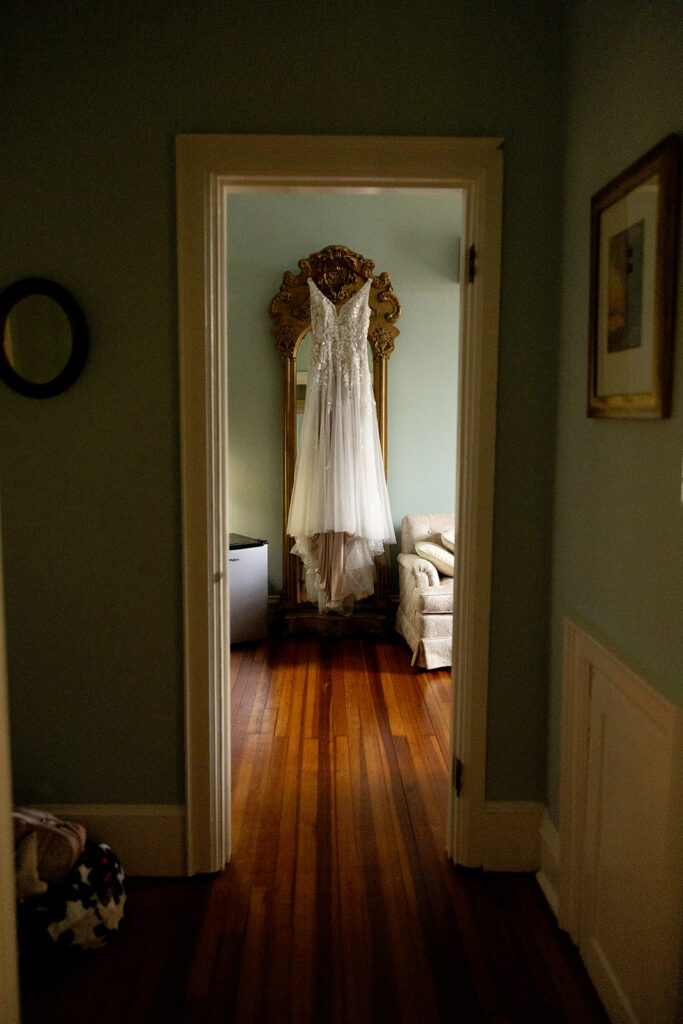 Close-up of wedding rings and bridal accessories at a Fredericksburg wedding venue.