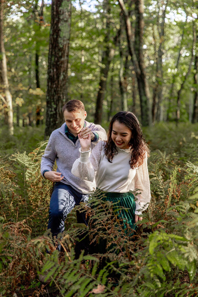 Bride and groom pose for engagement photos at golden hour in Shenandoah Valley with Victoria V Photography. Shenandoah wedding photographer. Shenandoah elopement photographer. Shenandoah sunset. Little Stony Man. Sunsets at Little Stony Man. Little Stony Man engagement session. Virginia elopement photographer.