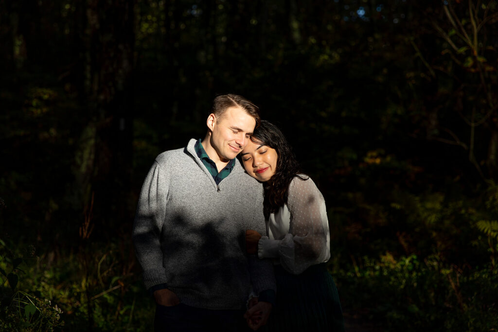 Bride and groom pose for engagement photos at golden hour in Shenandoah Valley with Victoria V Photography. Shenandoah wedding photographer. Shenandoah elopement photographer. Shenandoah sunset. Little Stony Man. Sunsets at Little Stony Man. Little Stony Man engagement session. Virginia elopement photographer.