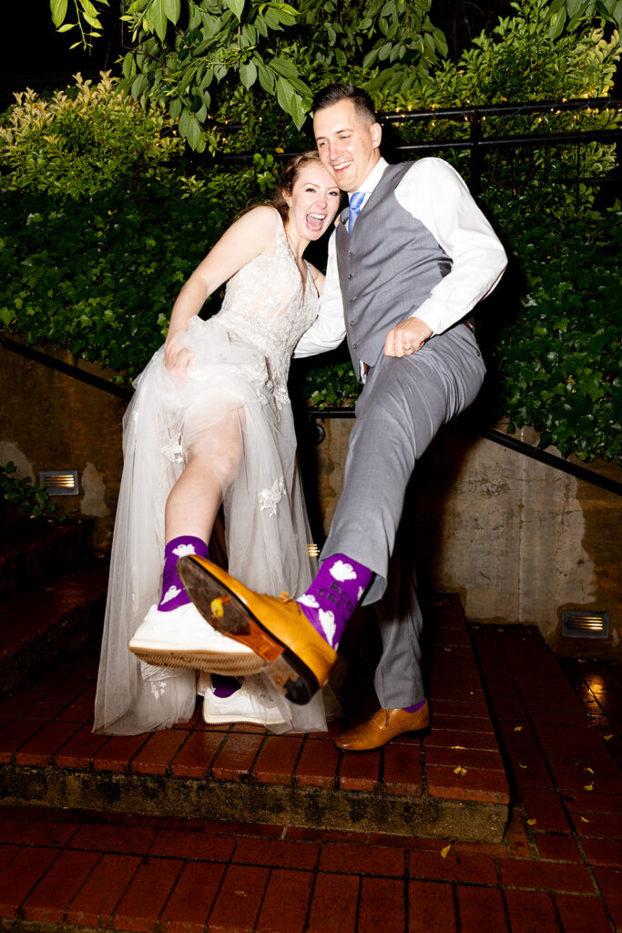 Romantic wedding portraits in downtown Fredericksburg, VA with a happy newlywed couple.