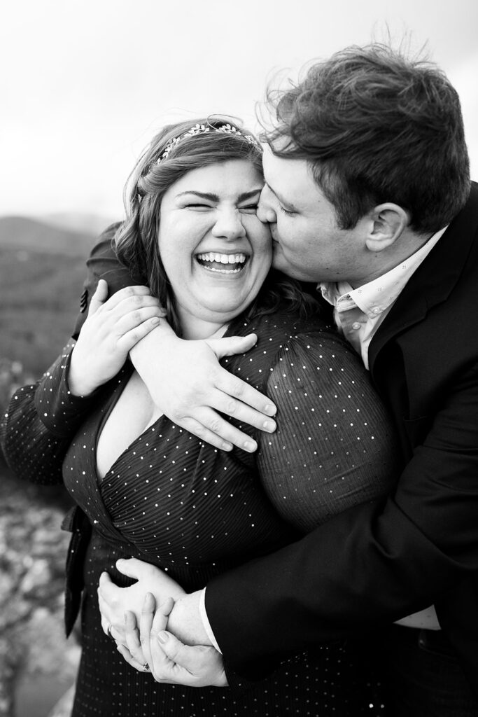 Bride and groom share a laugh and an embrace post wedding ceremony and elopement at Little Stonyman