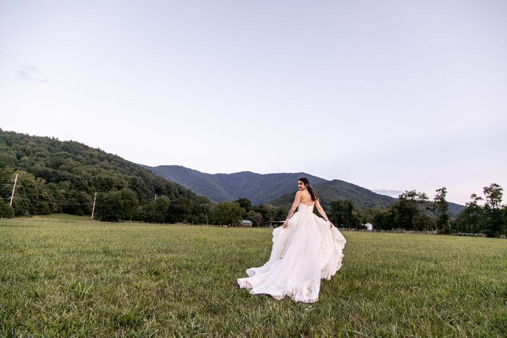 Bride and groom at their elegant Blue Ridge Mountain wedding at Stoneyman Valley Ranch – romantic sunset portraits, adventurous love, and breathtaking views.