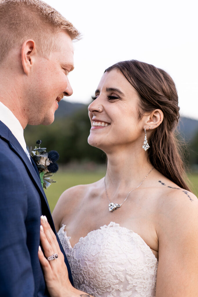 Bride and groom at their elegant Blue Ridge Mountain wedding at Stoneyman Valley Ranch – romantic sunset portraits, adventurous love, and breathtaking views.