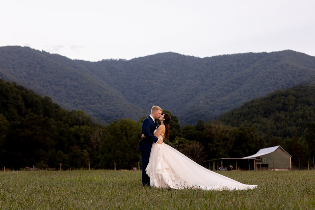 Bride and groom at their elegant Blue Ridge Mountain wedding at Stoneyman Valley Ranch – romantic sunset portraits, adventurous love, and breathtaking views.