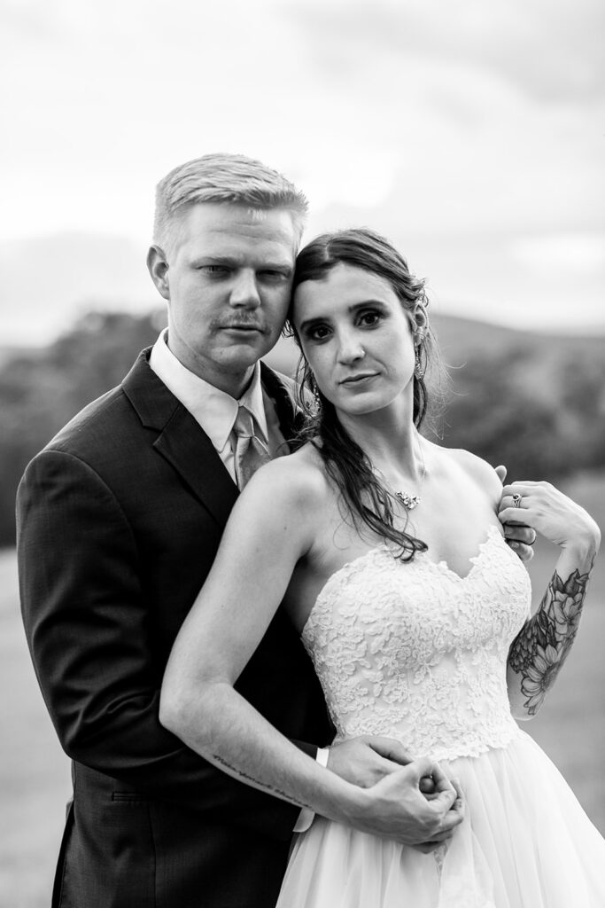 Bride and groom at their elegant Blue Ridge Mountain wedding at Stoneyman Valley Ranch – romantic sunset portraits, adventurous love, and breathtaking views.