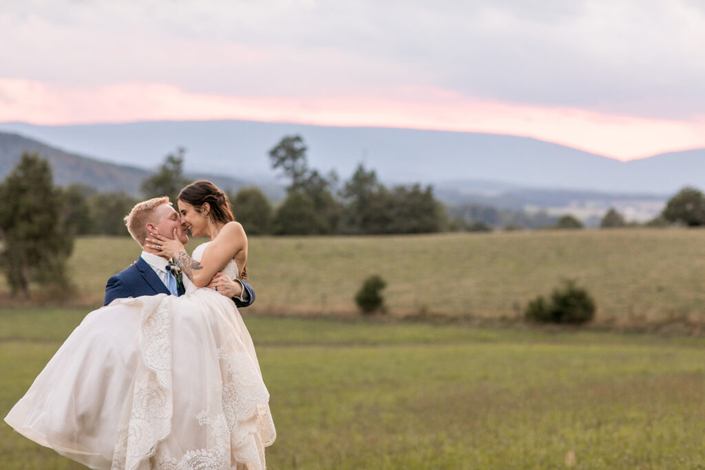 Bride and groom at their elegant Blue Ridge Mountain wedding at Stoneyman Valley Ranch – romantic sunset portraits, adventurous love, and breathtaking views.