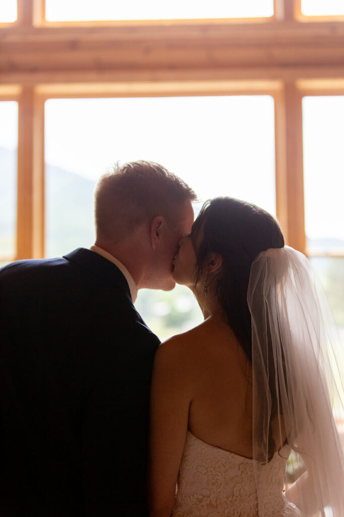 Bride and groom at their elegant Blue Ridge Mountain wedding at Stoneyman Valley Ranch – romantic sunset portraits, adventurous love, and breathtaking views.