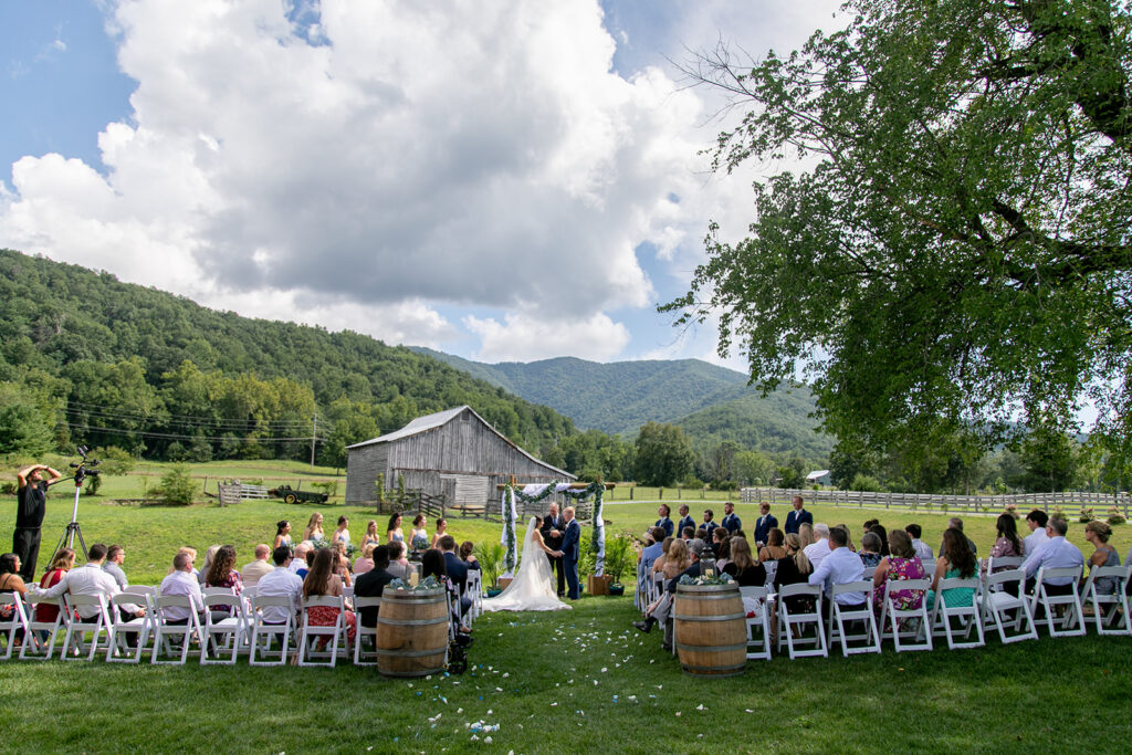 Bride and groom at their elegant Blue Ridge Mountain wedding at Stoneyman Valley Ranch – romantic sunset portraits, adventurous love, and breathtaking views.