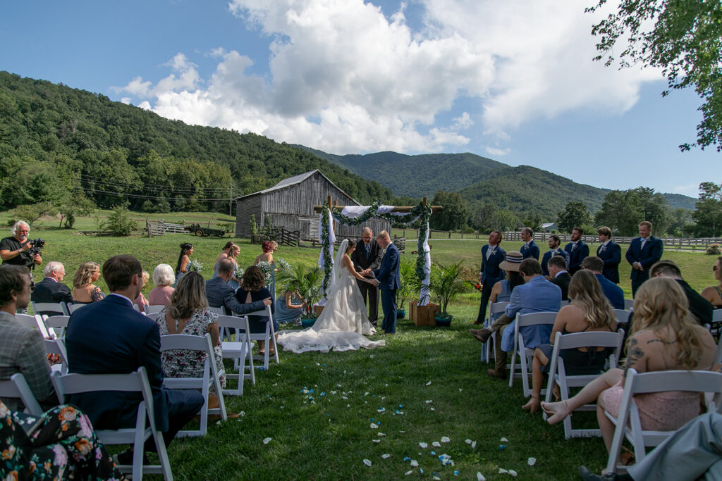 Bride and groom at their elegant Blue Ridge Mountain wedding at Stoneyman Valley Ranch – romantic sunset portraits, adventurous love, and breathtaking views.