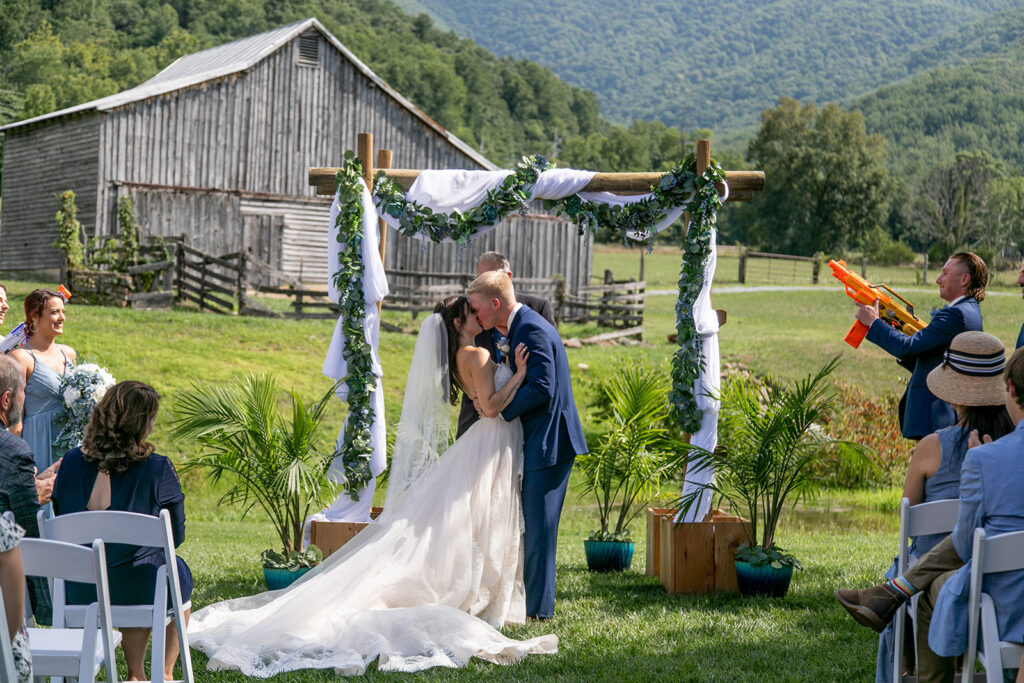 Bride and groom at their elegant Blue Ridge Mountain wedding at Stoneyman Valley Ranch – romantic sunset portraits, adventurous love, and breathtaking views.